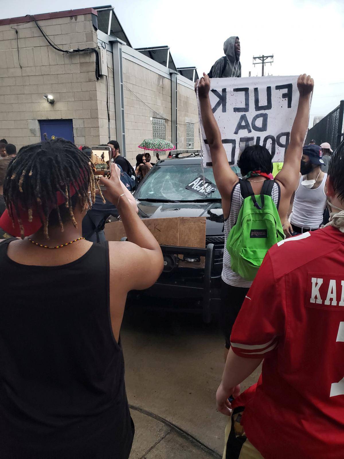 People take part in a protest after the death of George Floyd in Minneapolis