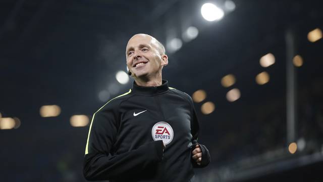 Referee Mike Dean during the warm up before the match