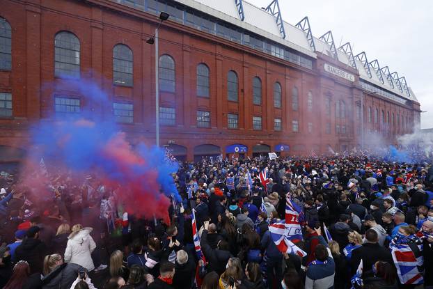 Rangers fans celebrate winning the Scottish Premiership Title