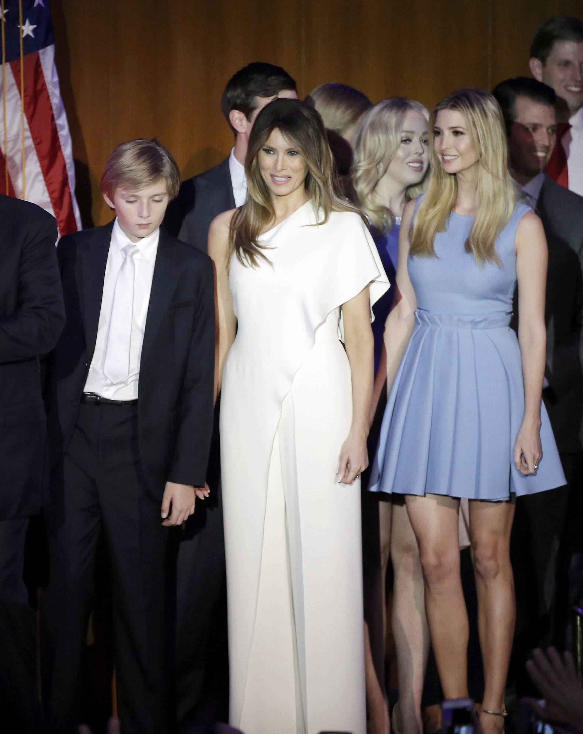 U.S. President-elect Donald Trump, his wife Melania, daughter Ivanka, son Barron and other family members greet supporters during his election night rally in Manhattan