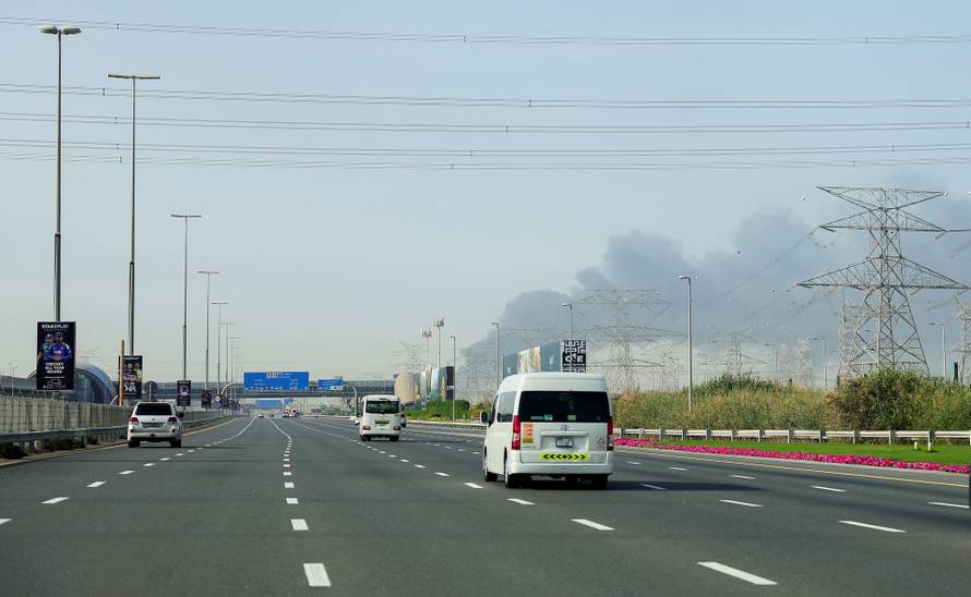 Smoke billows from Jebel Ali port after an Iranian attack, following United States and Israel strikes on Iran, in Dubai