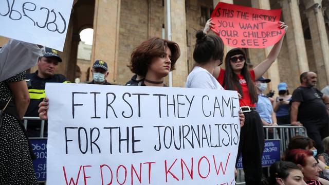 A rally in memory of Pirveli TV channel cameraman Alexander Lashkarava, a victim of violence against LGBT+ activists and journalists, in Tbilisi