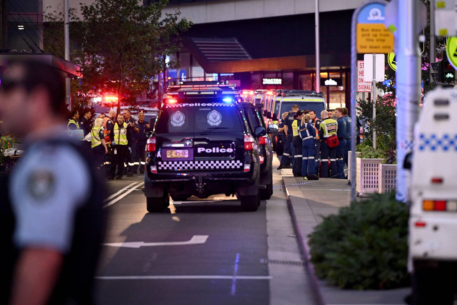 Emergency service workers are seen at the scene at Bondi Junction after multiple people were stabbed inside the eastern suburbs shopping centre in Sydney