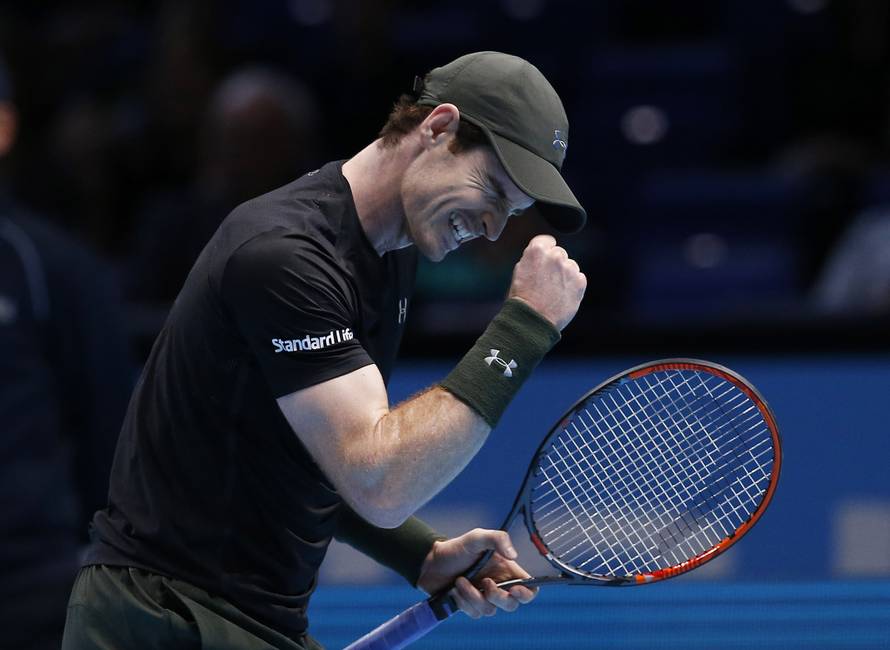 Great Britain's Andy Murray celebrates winning his round robin match against Japan's Kei Nishikori