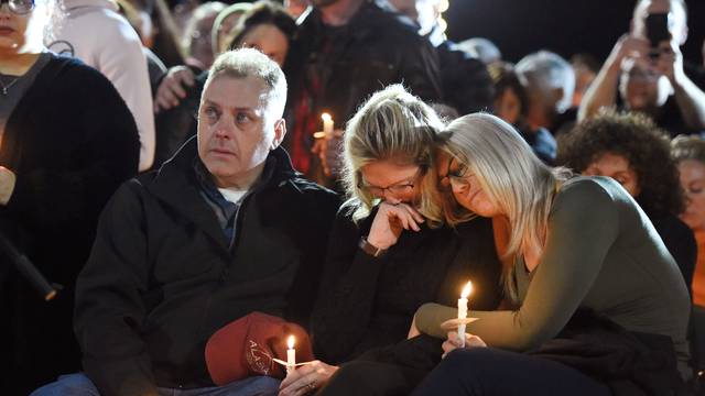 Jill Richardson Perez mother of Matt Coons mourns the loss of her son during a candle-light vigil for the victims of a limousine accident in Amsterdam New York