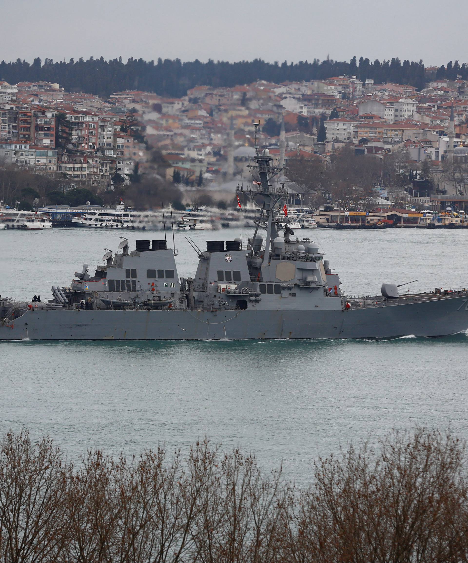 U.S. Navy guided-missile destroyer USS Porter sails in the Bosphorus, on its way to the Mediterranean Sea, in Istanbul