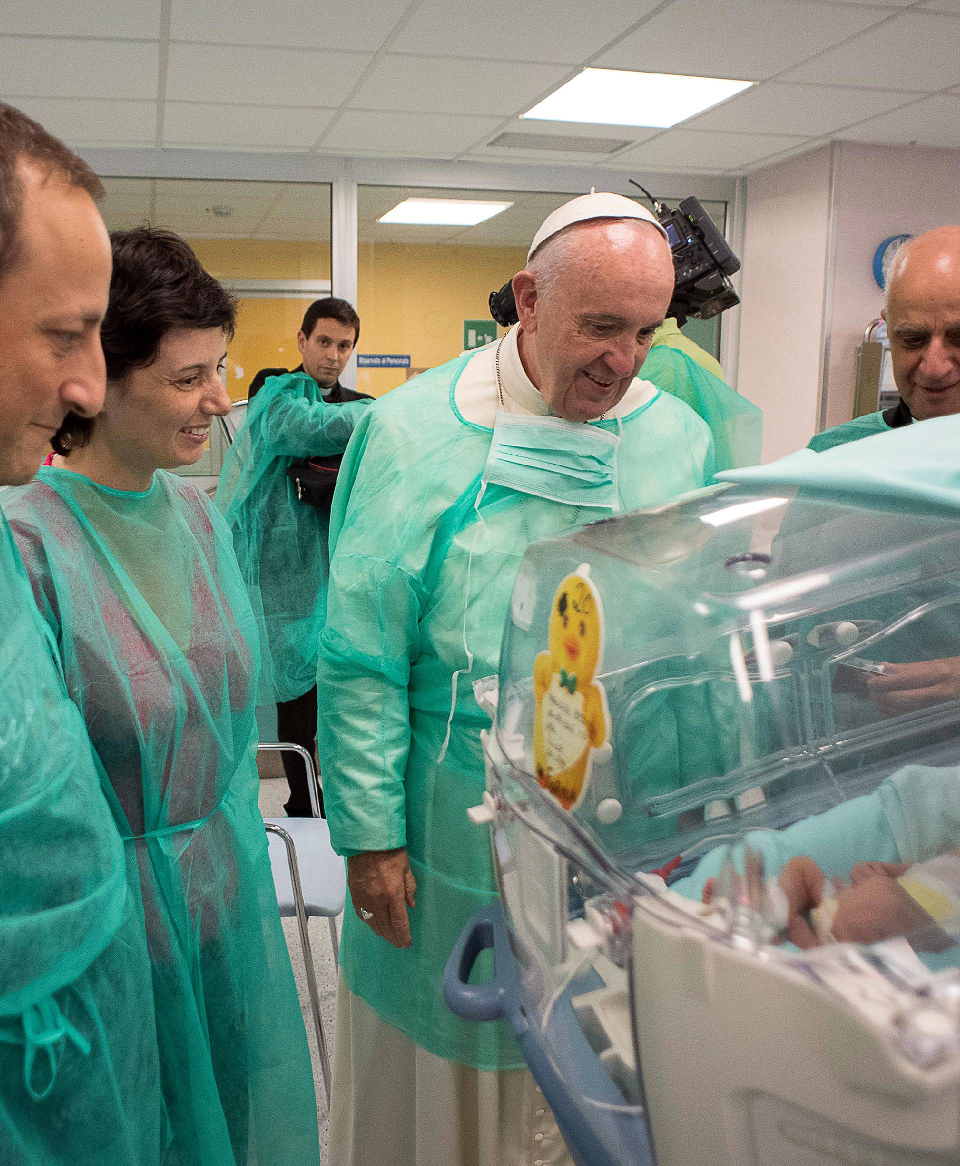 Pope Francis visits the intensive care nursery at the San Giovanni hospital in Rome