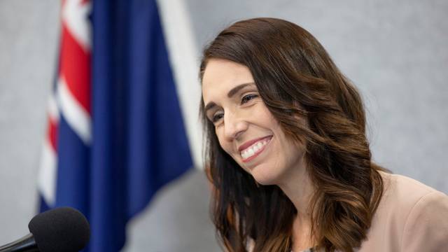 New Zealand Prime Minister Jacinda Ardern smiles during a news conference prior to the anniversary of the mosque attacks that took place the prior year in Christchurch