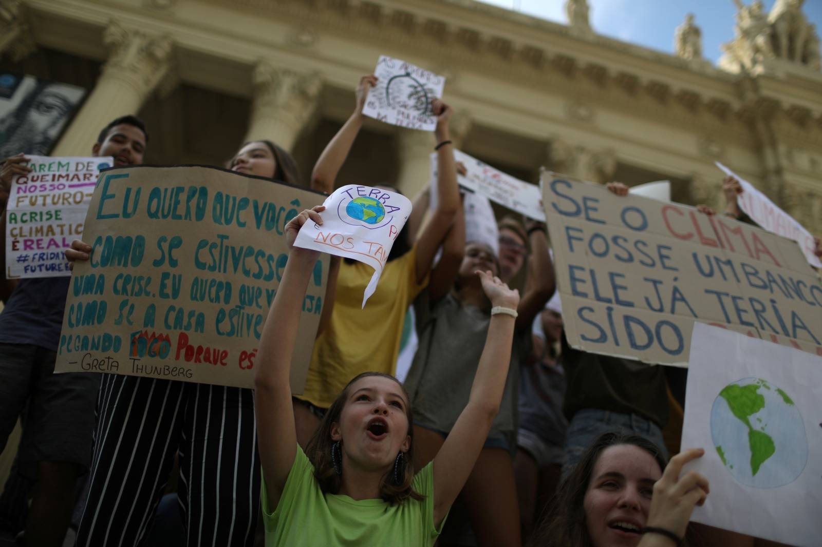 Demonstrators take part in the world march for climate change and the environment, called by the organization Fridays for Future outside the Rio de Janeiro State Assembly