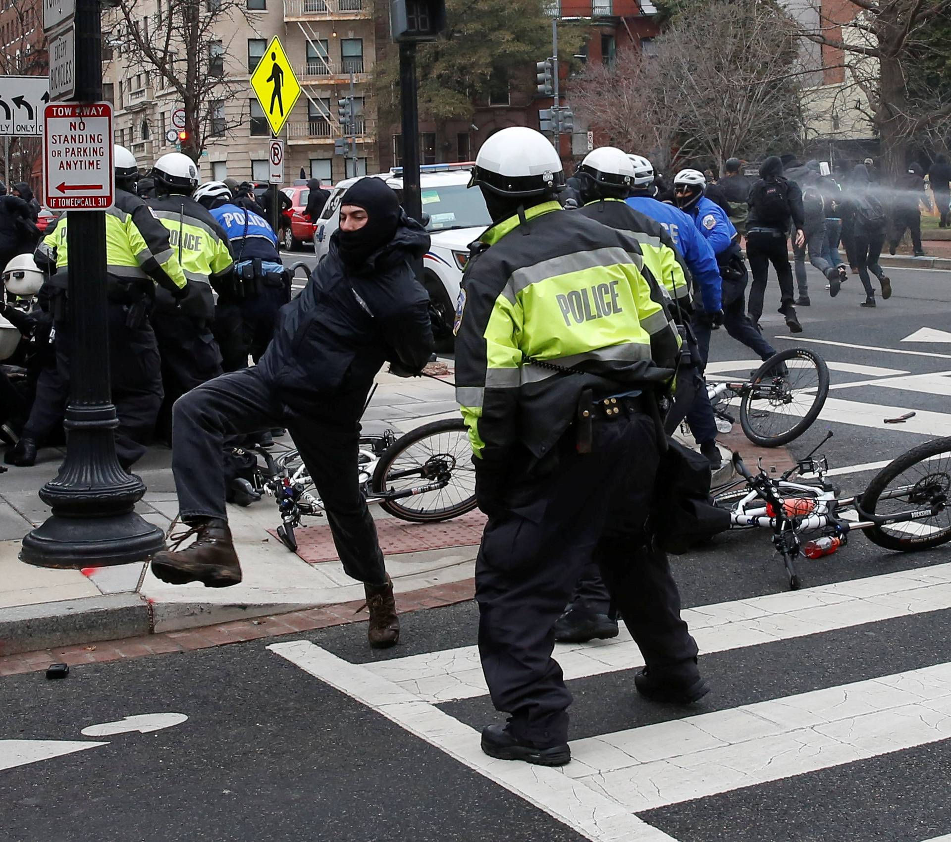 Protesters clash with police during demonstration against Trump on the sidelines of the inauguration in Washington