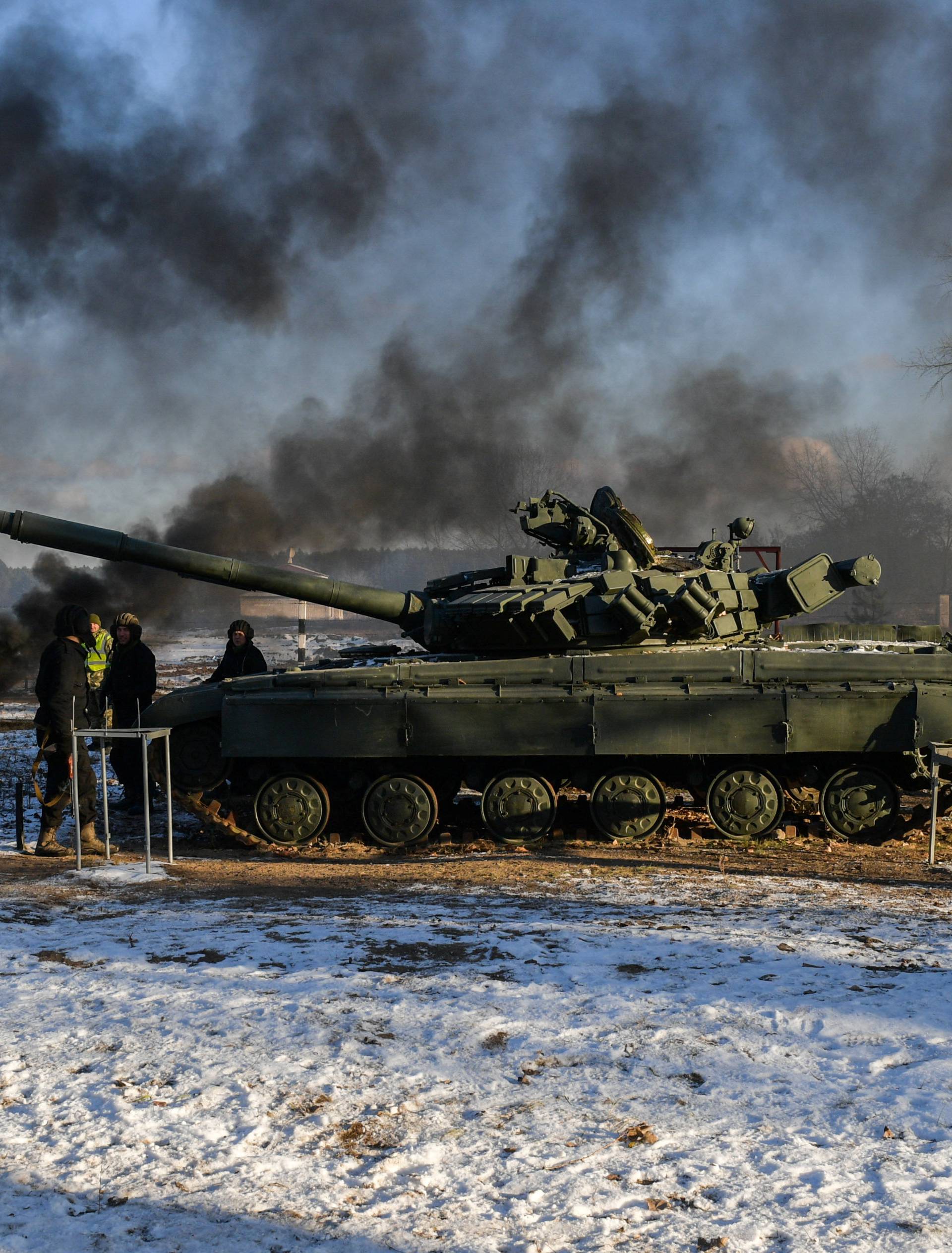Ukrainian servicemen take part in drills as President Poroshenko visits a military training centre in Chernihiv Region