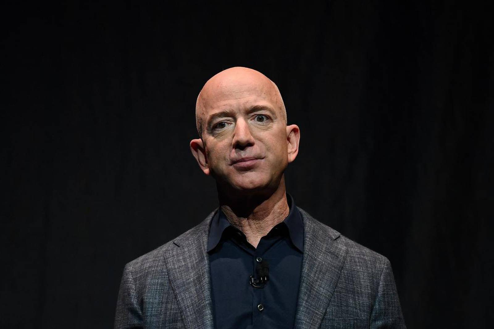 FILE PHOTO: Amazon founder Jeff Bezos speaks during an event about Blue Origin's space exploration plans in Washington