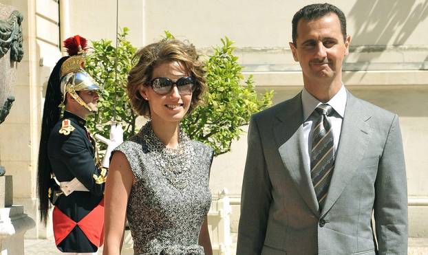 Paris, France. 08th Dec, 2024. Syrian President Bashar Al Assad and his wife Asma Al Assad arrive at official lunch held at the Hotel Marigny in Paris, France on July 14, 2008. Nicolas Sarkozy presides for the first time over Bastille Day national holiday