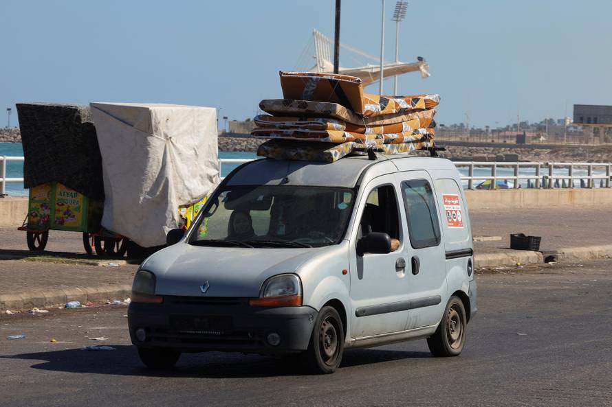Displaced people make their way back to their homes in southern Lebanon following a deal between the U.S. and Iran, in Sidon