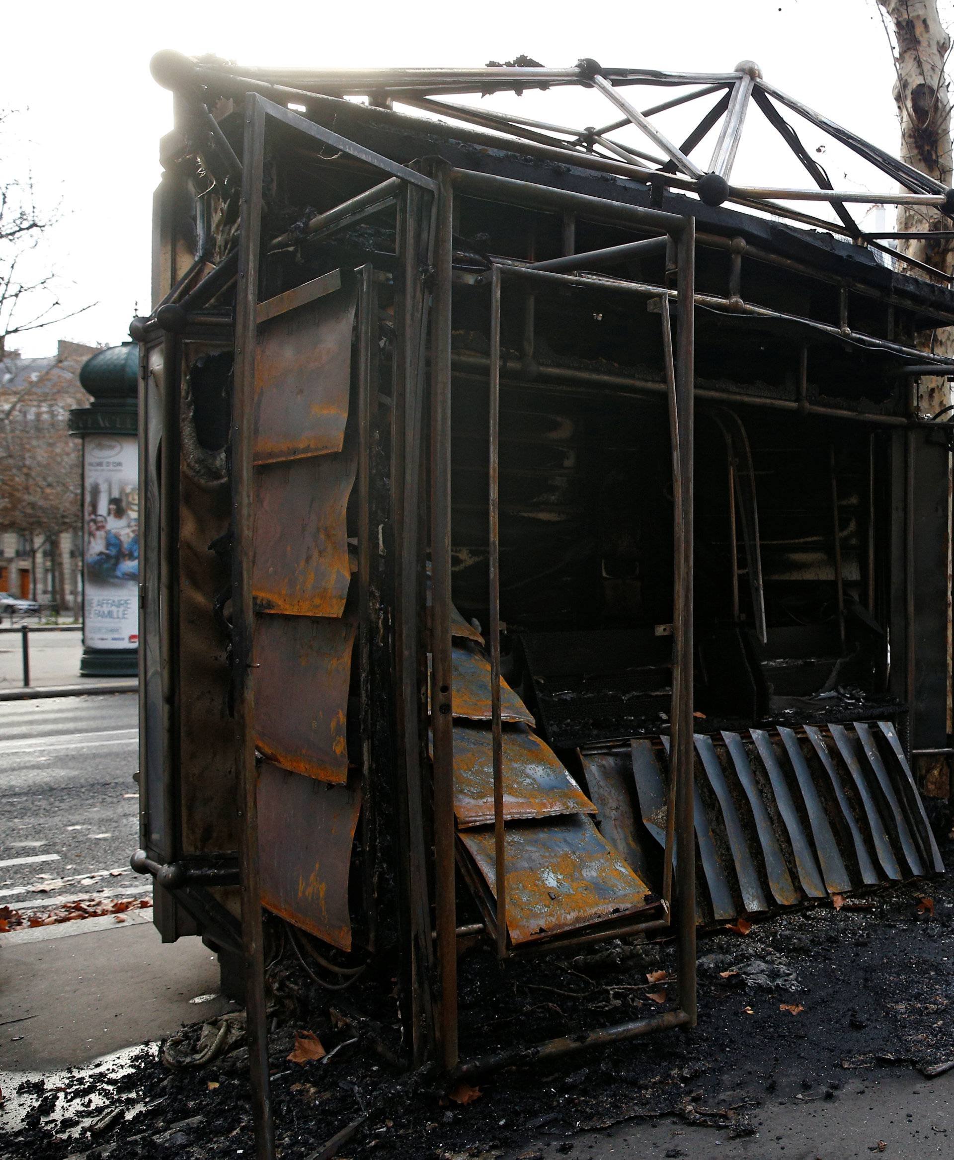 A vandalized news stand is seen the day after clashes during a national day of protest by the "yellow vests" movement in Paris