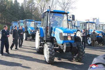North Korean leader Kim Jong Un gives field guidance to the Kumsong Tractor Factory in this undated picture provided by KCNA