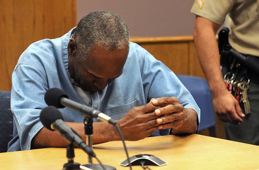 O.J. Simpson reacts during his parole hearing at Lovelock Correctional Centre in Lovelock