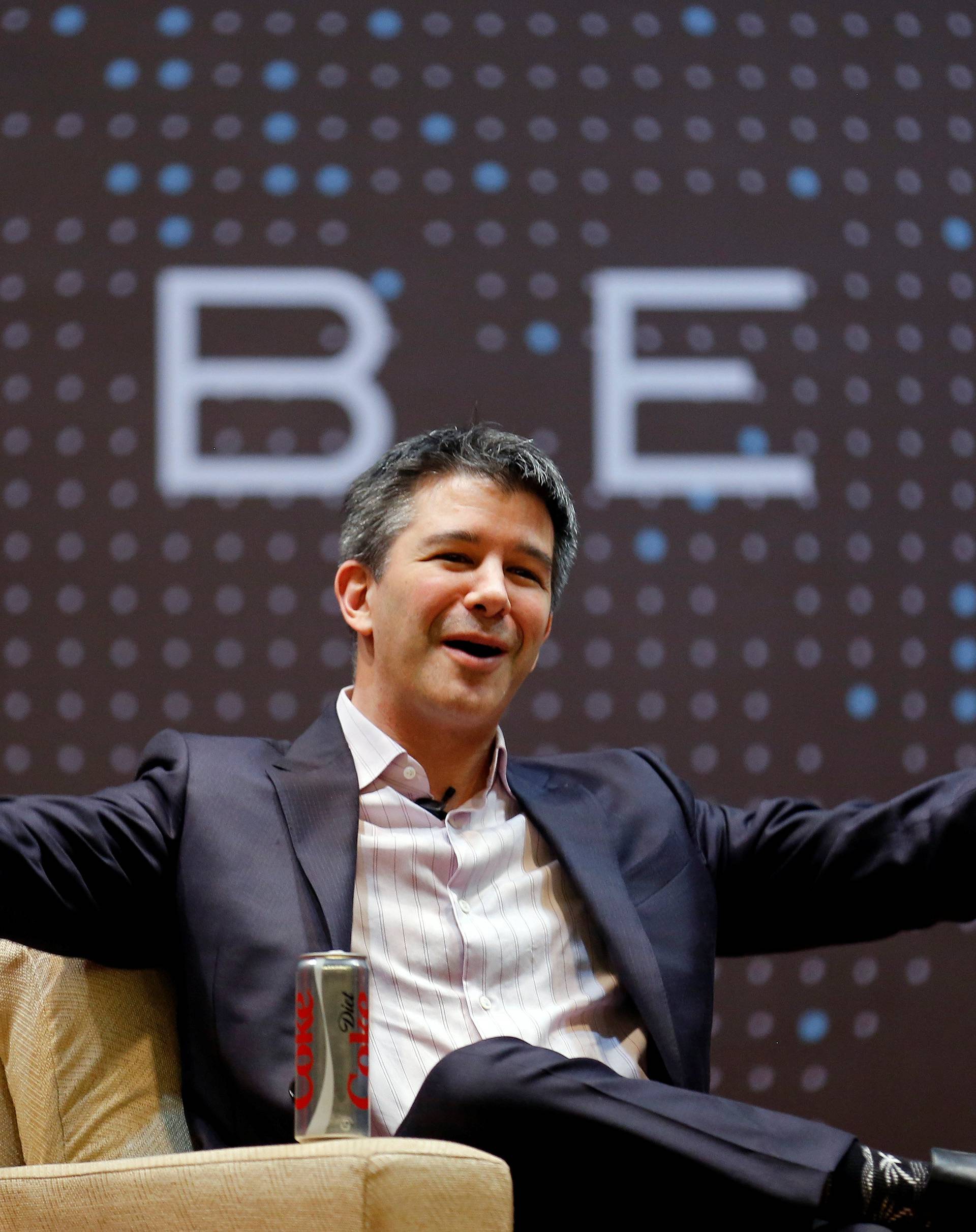 FILE PHOTO - Uber CEO Kalanick speaks to students during an interaction at IIT campus in Mumbai