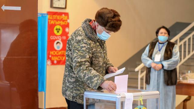People vote during Kazakhstan's parliamentary election in Almaty