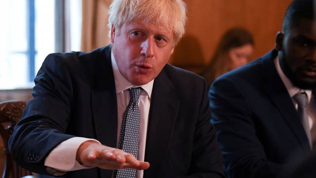 FILE PHOTO: Britain's Prime Minister Boris Johnson attends a roundtable on the criminal justice system at 10 Downing Street