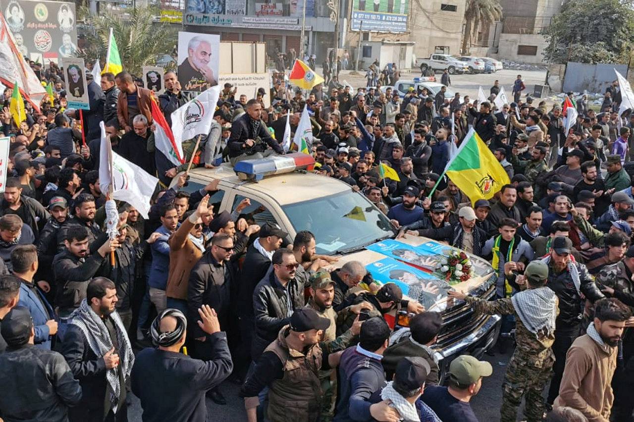 Mourners attend the funeral of the Iranian Major-General Qassem Soleimani and the Iraqi militia commander Abu Mahdi al-Muhandis, in Baghdad