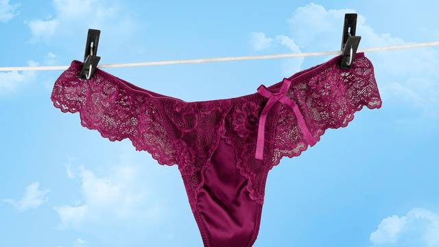 Sexy female underwear drying on rope