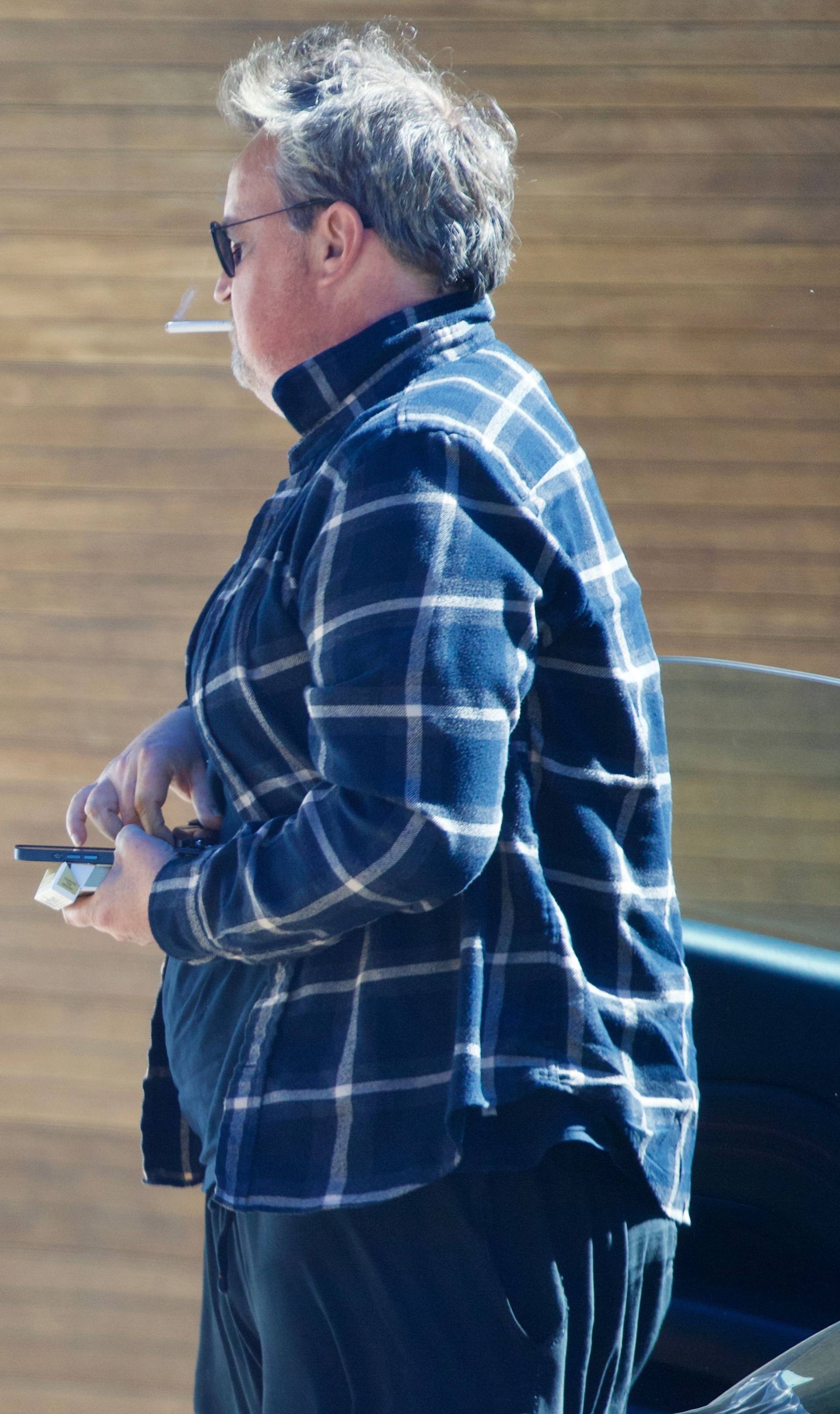 Exclusive - Matthew Perry Puffs on a Cigarette as he Steps out in Los Feliz, Los Angeles, California, USA - 28 Oct 2021