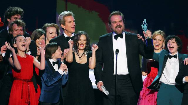 FILE PHOTO: The cast of Stranger Things accepts their award during the 23rd Screen Actors Guild Awards in Los Angeles