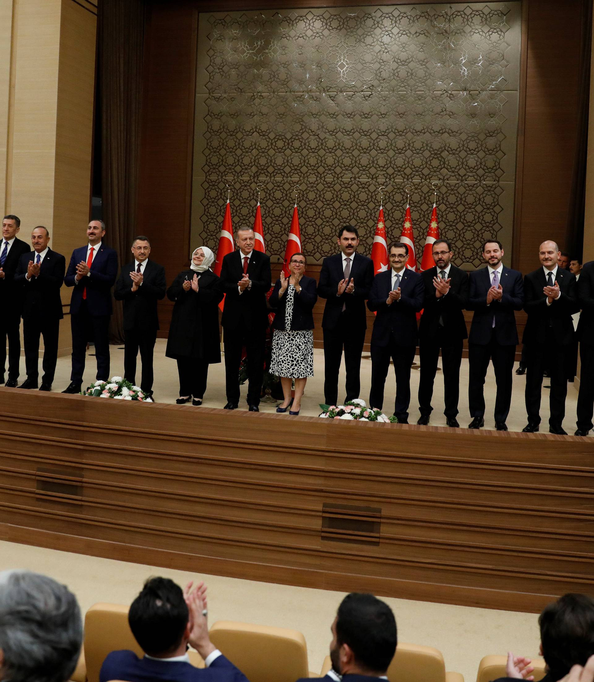 Turkish President Tayyip Erdogan poses with his new cabinet at the Presidential Palace in Ankara