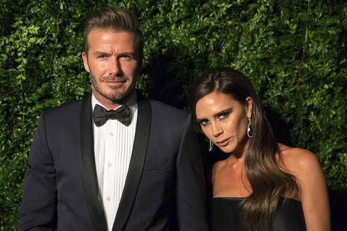 Former British soccer player David Beckham and his wife Victoria attend the Evening Standard Theatre Awards in London