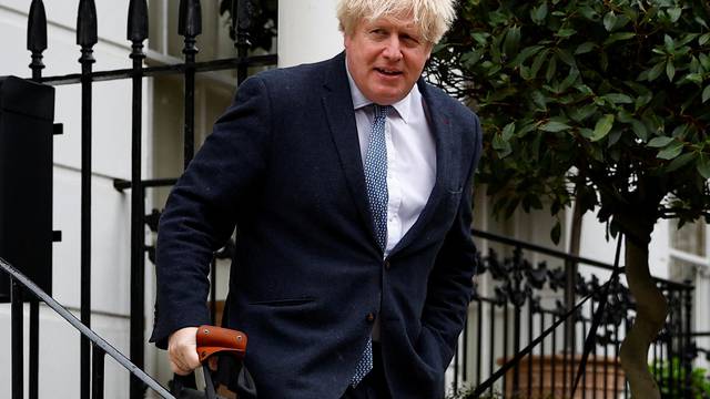 Former British Prime Minister Boris Johnson leaves his home, in London
