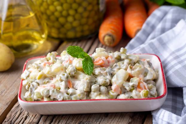 Russian salad Olivier with mayonnaise and egg served (Turkish na