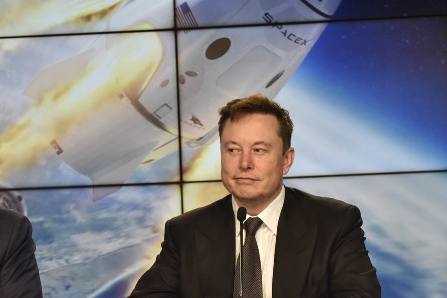 SpaceX founder and chief engineer Elon Musk attends a post-launch news conference to discuss the  SpaceX Crew Dragon astronaut capsule in-flight abort test at the Kennedy Space Center