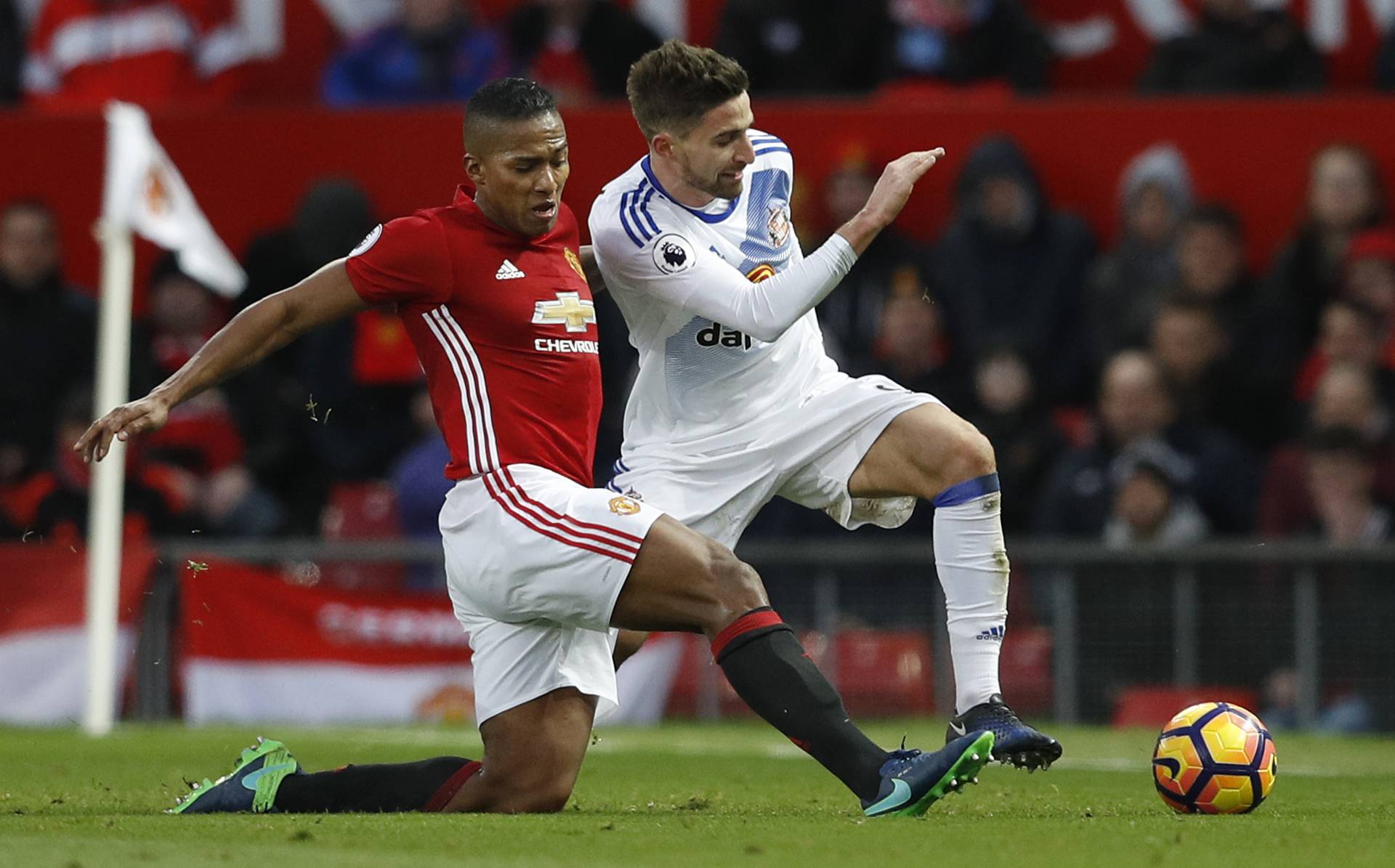 Sunderland's Fabio Borini in action with Manchester United's Antonio Valencia