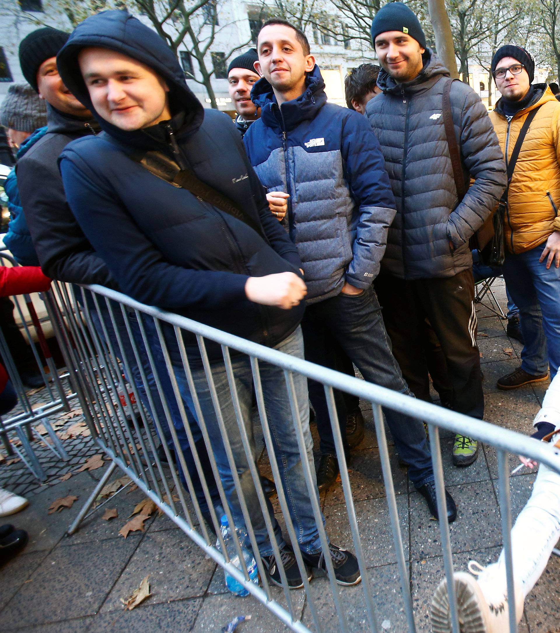 People queue for the iPhone X launch outside the Apple store in Berlin