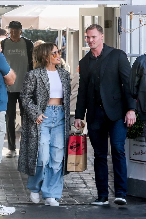 *EXCLUSIVE* Jennifer Lopez glows with holiday cheer after Brentwood Country Mart shopping