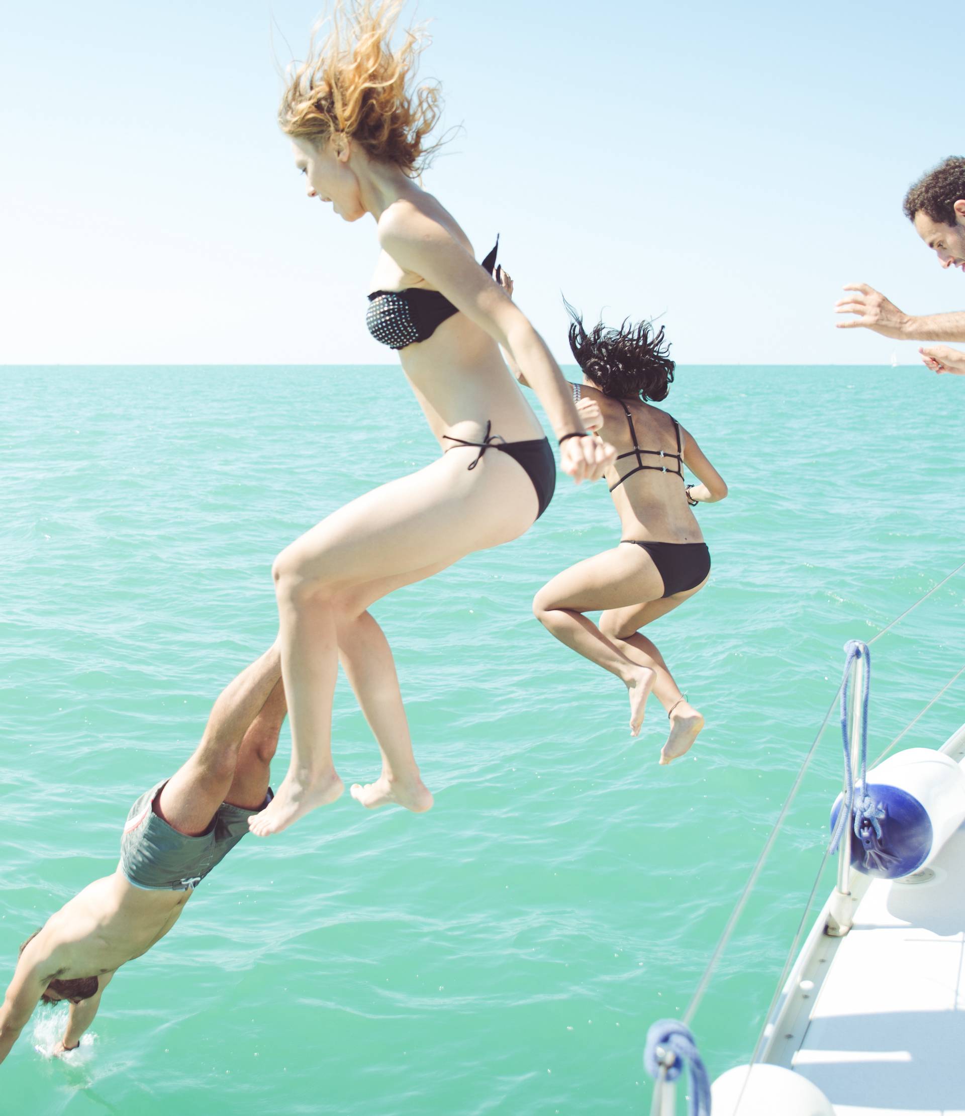 diving in the water during a boat excursion