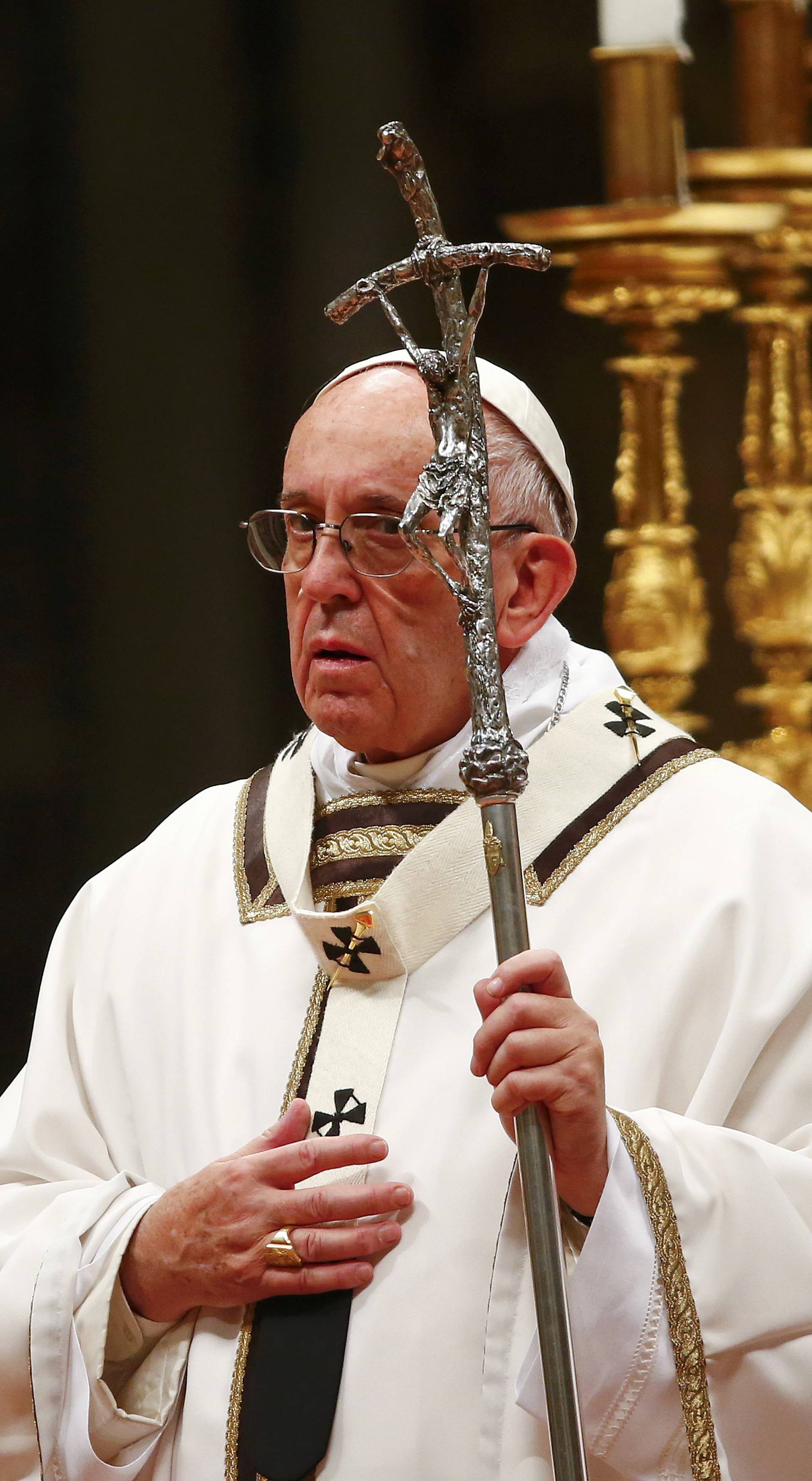 Pope Francis leads the Christmas night Mass in Saint Peter's Basilica at the Vatican