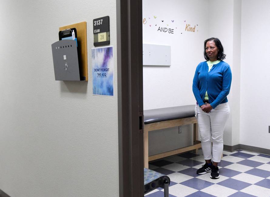 Dr. Ana Montanez poses for pictures amidst a measles outbreak in Lubbock, Texas