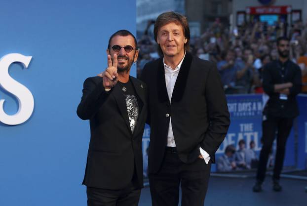 FILE PHOTO: Former Beatles Ringo Starr and Paul McCartney attend the world premiere of The Beatles: 