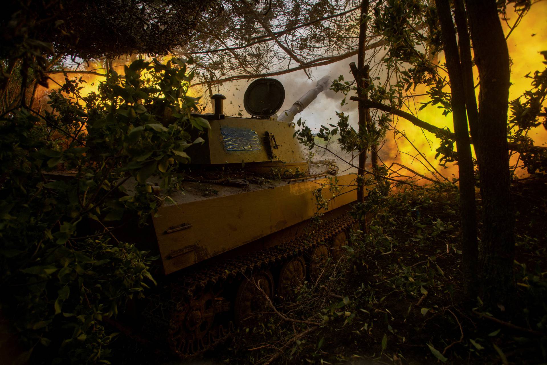 FILE PHOTO: Ukrainian servicemen fire a 2S1 Gvozdika self propelled howitzer towards Russian troops at a position near Chasiv Yar