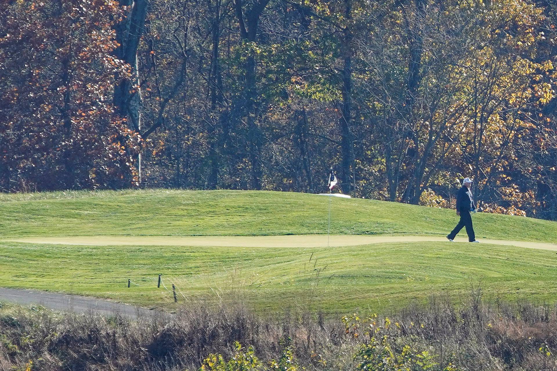 U.S. President Donald Trump plays golf after the 2020 U.S. presidential election was called for Democratic presidential candidate former Vice President Joe Biden at the Trump National Golf Club in Sterling, Virginia