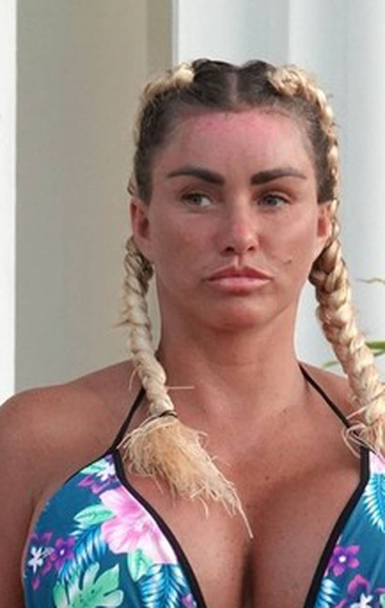 *EXCLUSIVE* WEB MUST CALL FOR PRICING  - Wearing her furry blue slippers and showing off the results of her biggest EVER boob job in her sexy multicoloured bikini, the British Glamour Model Katie Price is pictured enjoying her holiday in Thailand.
*PICTUR