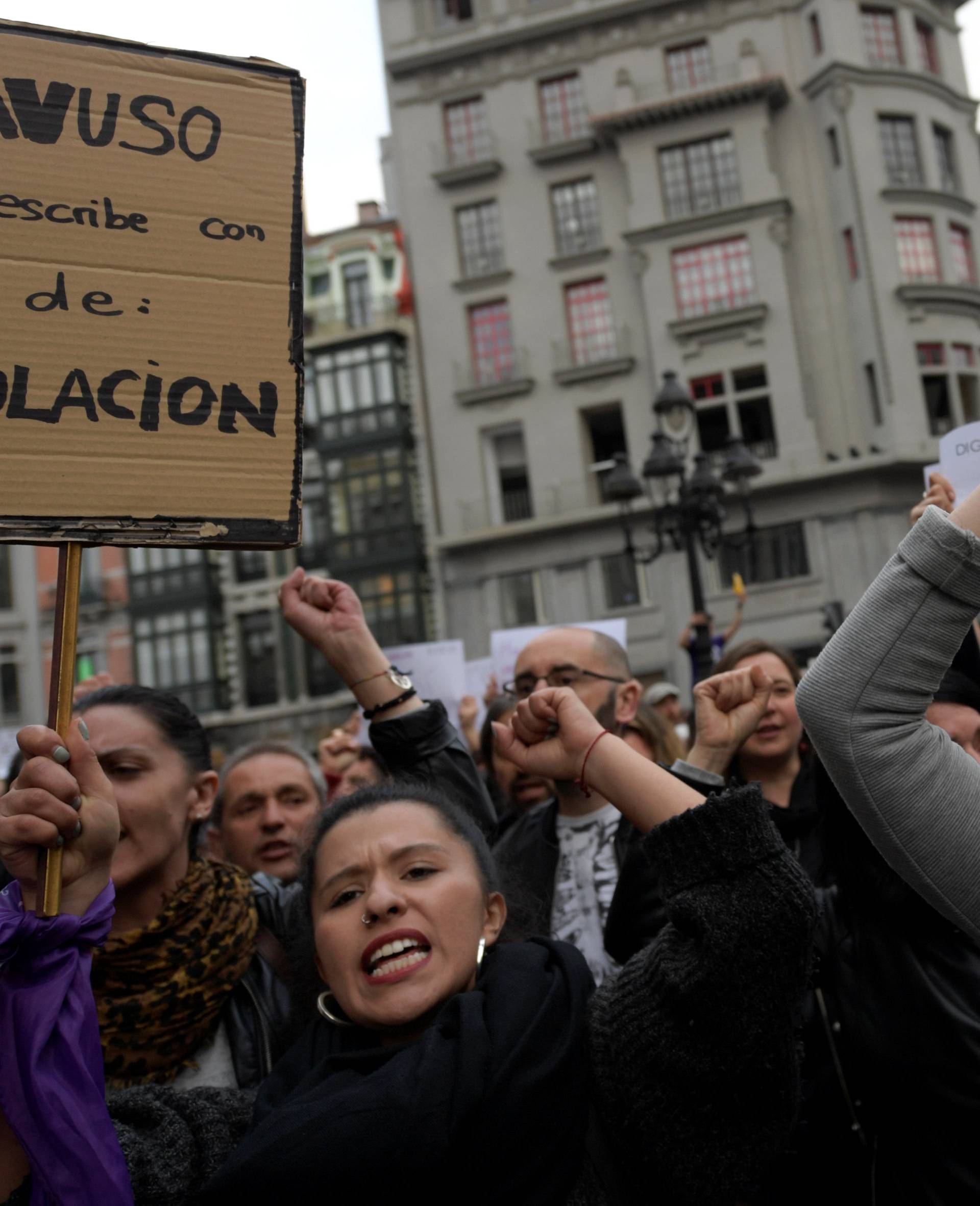 A woman cries during a protest after a Spanish court condemned five men accused of the group rape of an 18-year-old woman in Oviedo