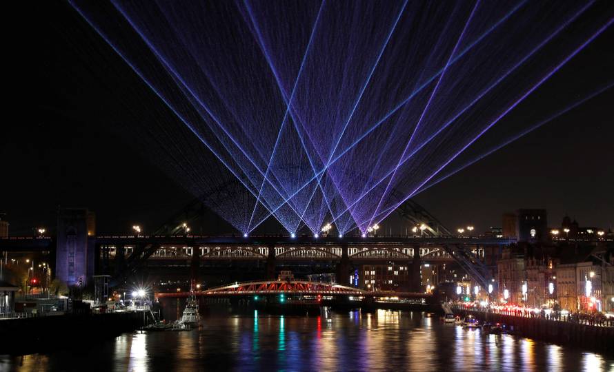 A laser show is seen designed by artist Seb Lee-Delisle and organised by Newcastle City Council to celebrate the New Year in Newcastle upon Tyne