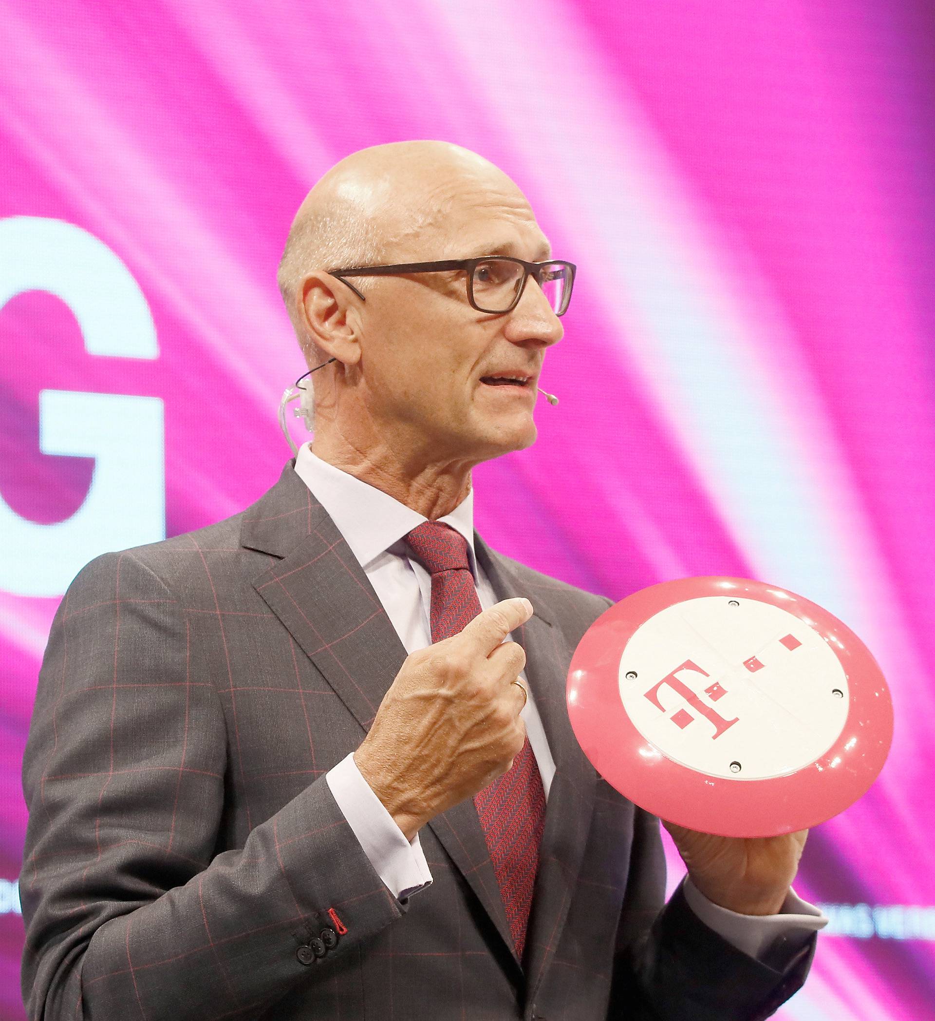 FILE PHOTO:Hoettges, CEO of Germany's Deutsche Telekom AG, attends the company's annual shareholder meeting in Cologne