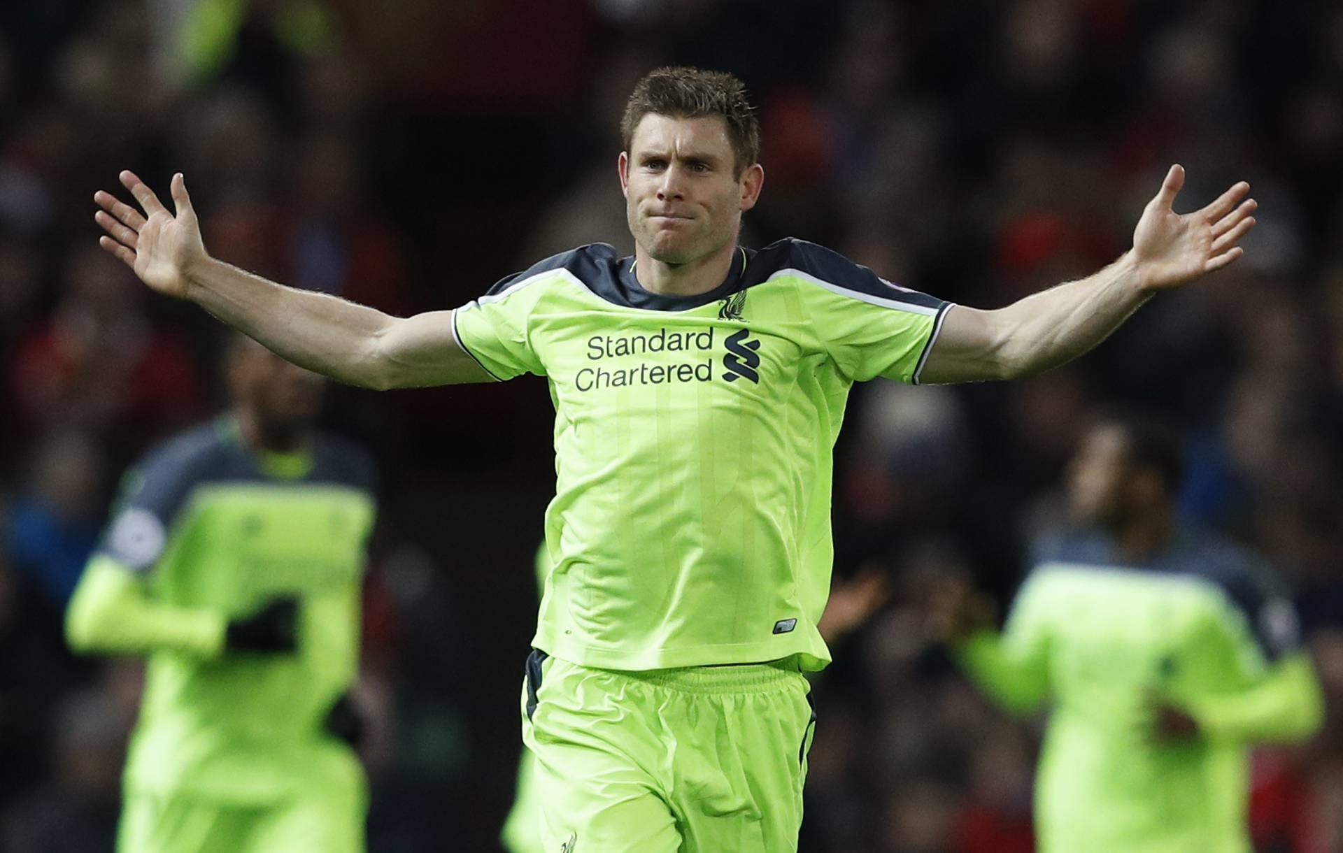 Liverpool's James Milner celebrates scoring their first goal