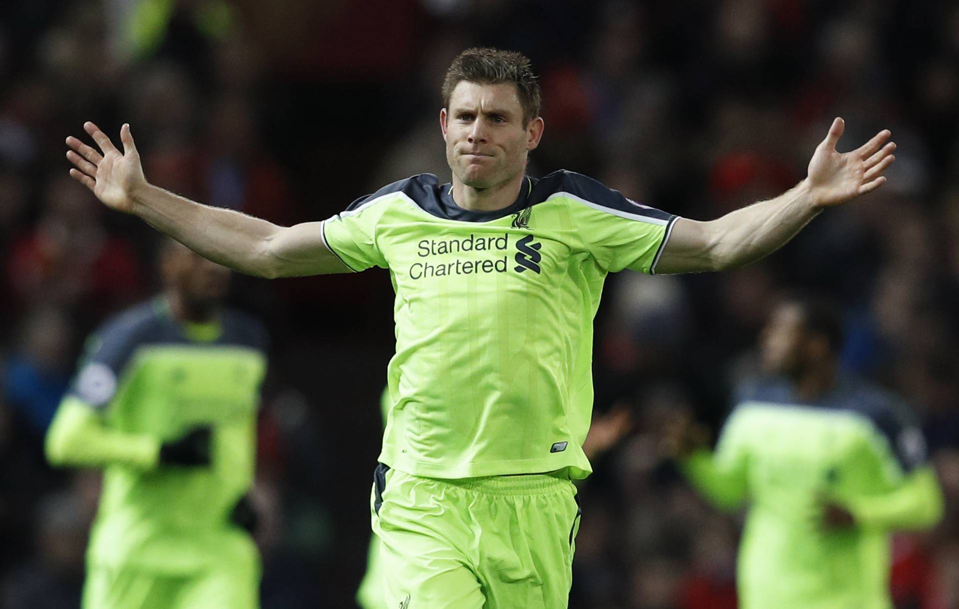 Liverpool's James Milner celebrates scoring their first goal