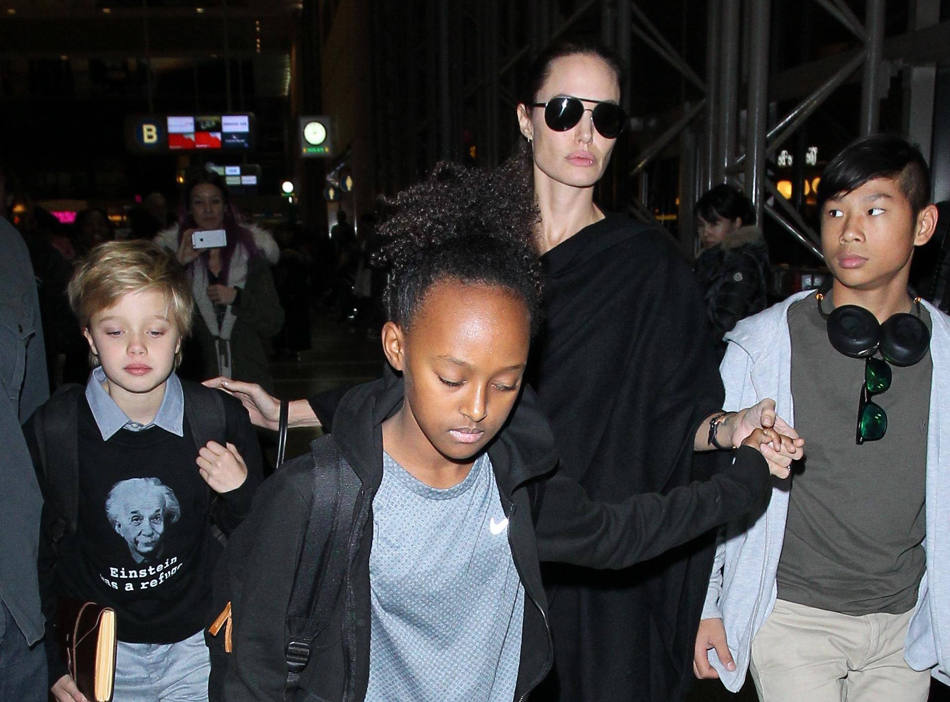 Angelina Jolie coming through LAX Airport, with her children Shiloh, Pax and Zahara. 7 March 2016.