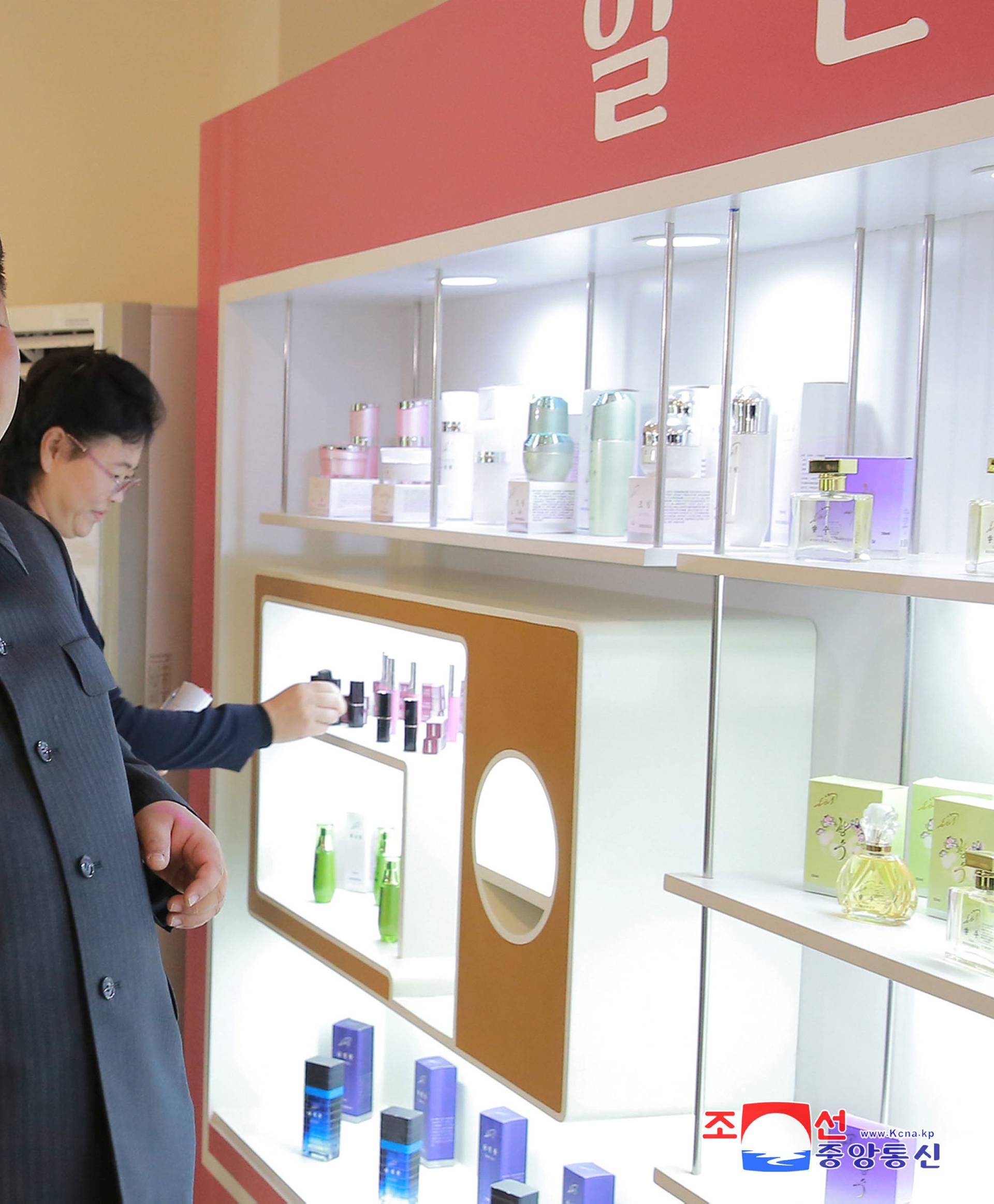 North Korean leader Kim Jong Un visits a cosmetics factory in this undated photo released by North Korea's Korean Central News Agency (KCNA) in Pyongyang